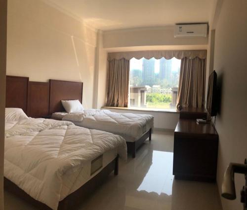 Imagen general del Ai Di Si Yang Sheng Apartment. Foto 1