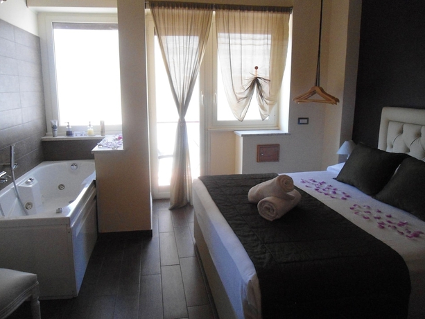 Imagen de la habitación del Aida Charming Rooms. Foto 13