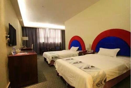Imagen de la habitación del Aiqinhai International Business Hotel. Foto 6