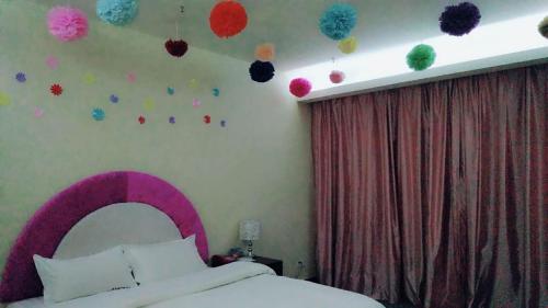 Imagen de la habitación del Aiqinhai International Business Hotel. Foto 7