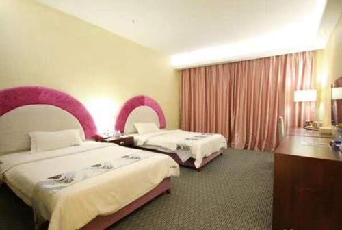 Imagen general del Aiqinhai International Business Hotel. Foto 3