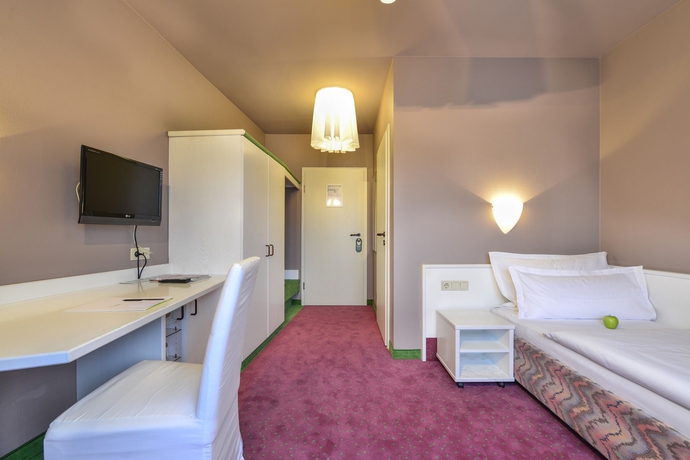 Imagen de la habitación del Airport Hotel By The New Yorker. Foto 9