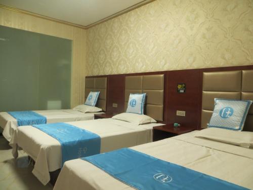 Imagen de la habitación del Airport Sheng Jie Inn. Foto 5