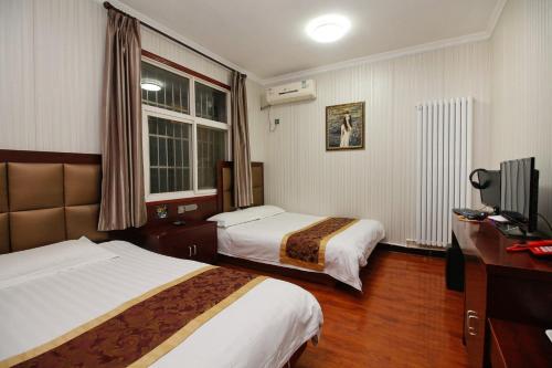 Imagen de la habitación del Airport Sheng Jie Inn. Foto 6