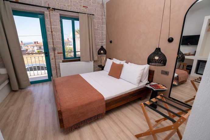 Imagen de la habitación del Ajlan Oia. Foto 2