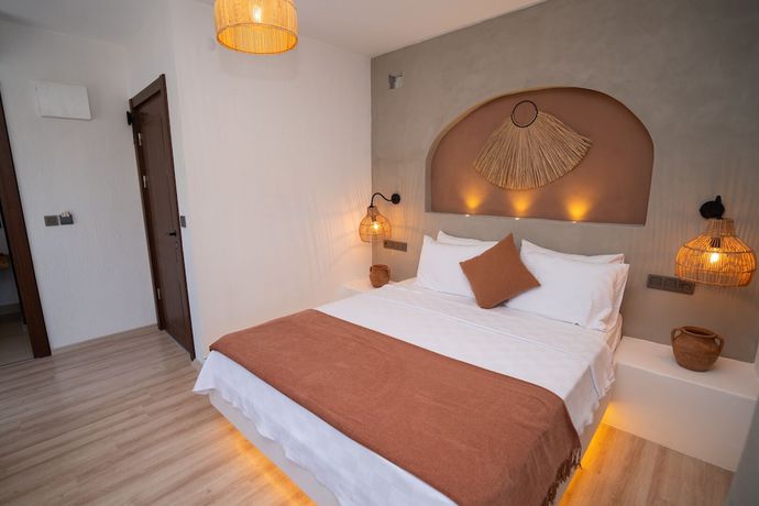 Imagen de la habitación del Ajlan Oia. Foto 3