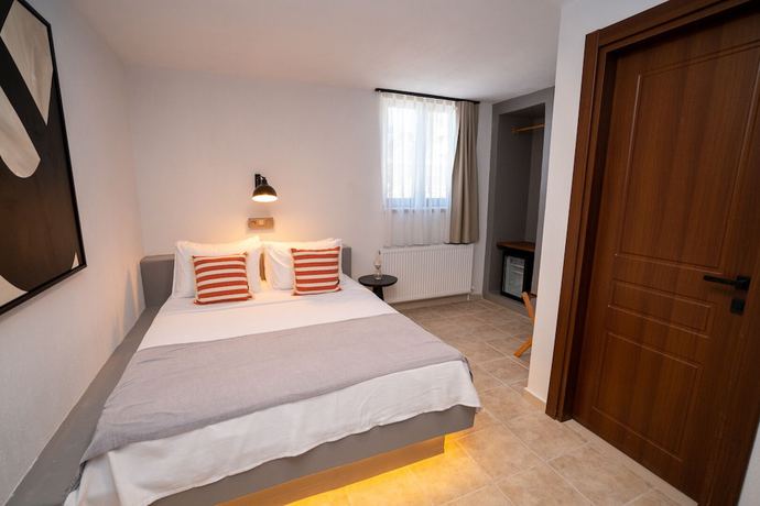 Imagen de la habitación del Ajlan Oia. Foto 5