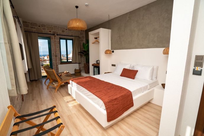 Imagen de la habitación del Ajlan Oia. Foto 8