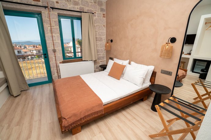 Imagen de la habitación del Ajlan Oia. Foto 9