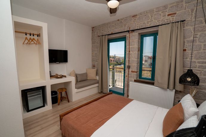 Imagen de la habitación del Ajlan Oia. Foto 18
