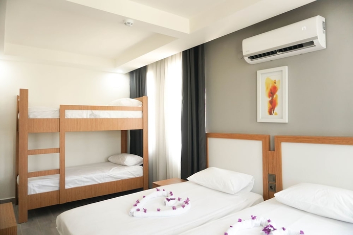 Imagen de la habitación del Akalia Resort Hotel. Foto 14