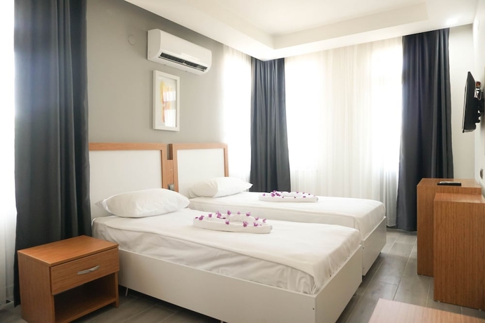 Imagen de la habitación del Akalia Resort Hotel. Foto 15