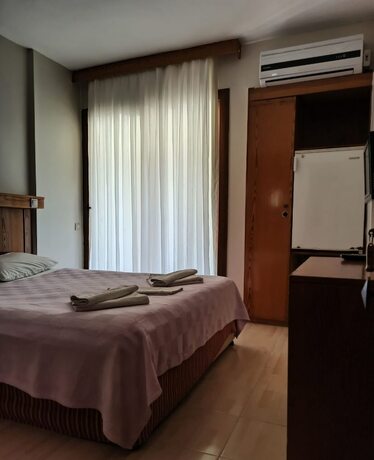 Imagen de la habitación del Akpinar Otel Cesme. Foto 19