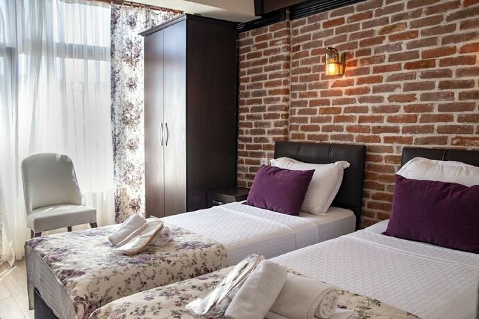 Imagen de la habitación del Aksac Hotel Cunda. Foto 13