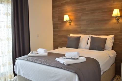 Imagen de la habitación del Aksu Hotel Alacati. Foto 2
