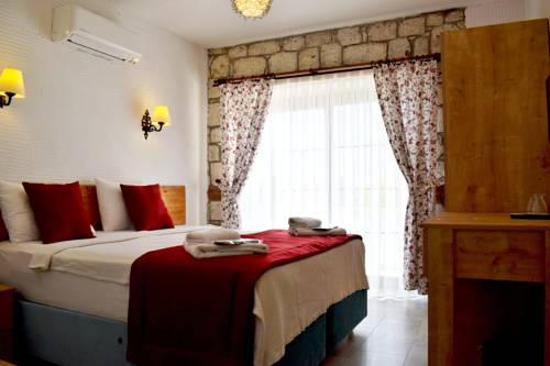 Imagen de la habitación del Aksu Hotel Alacati. Foto 5