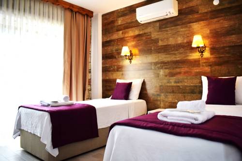 Imagen de la habitación del Aksu Hotel Alacati. Foto 6