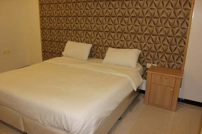Imagen de la habitación del Al Amoria Furnished Apartments 4. Foto 15