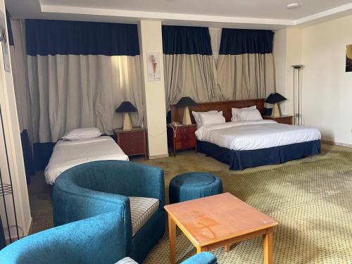 Imagen de la habitación del Al Fouad Pyramids View Hotel. Foto 19