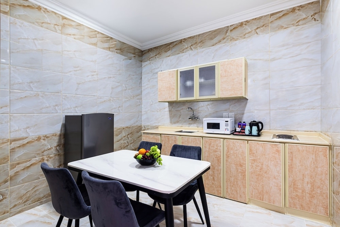 Imagen de la habitación del Al Qasr Hotel Suites - Albadie District. Foto 9