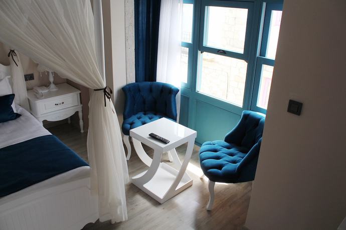 Imagen de la habitación del Ala Rosa Alacati Hotel - Adults Only. Foto 12