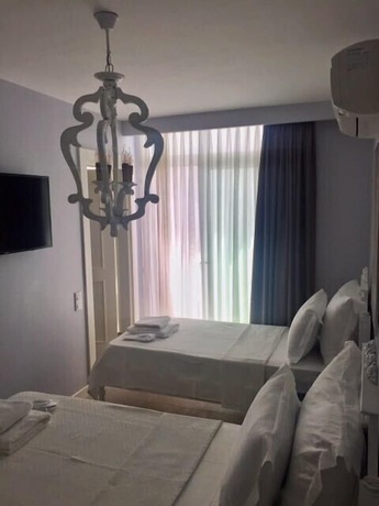 Imagen de la habitación del Alacaat Otel. Foto 13