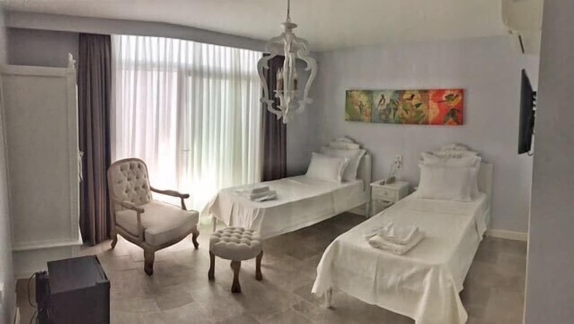 Imagen de la habitación del Alacaat Otel. Foto 16