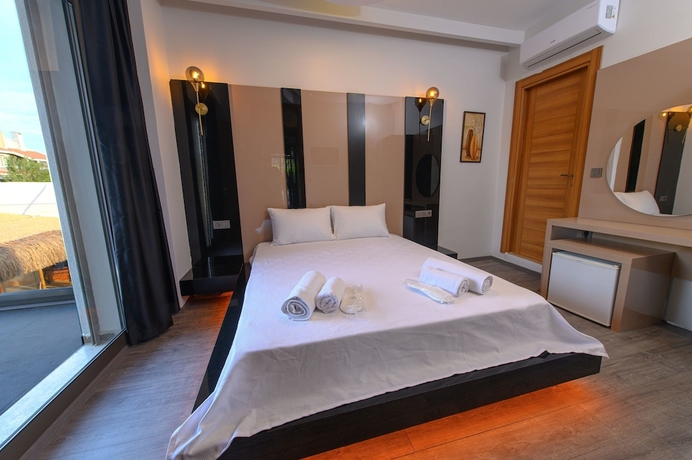 Imagen de la habitación del Alacas Hotel &Ccedil;eşme. Foto 11