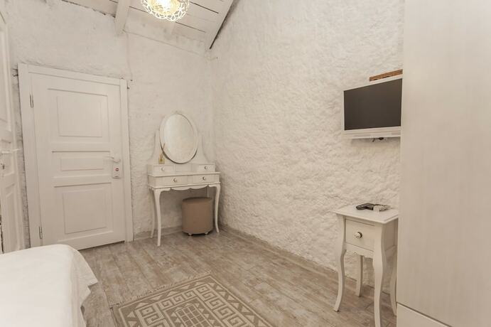 Imagen de la habitación del Alacati Alanur Otel. Foto 17