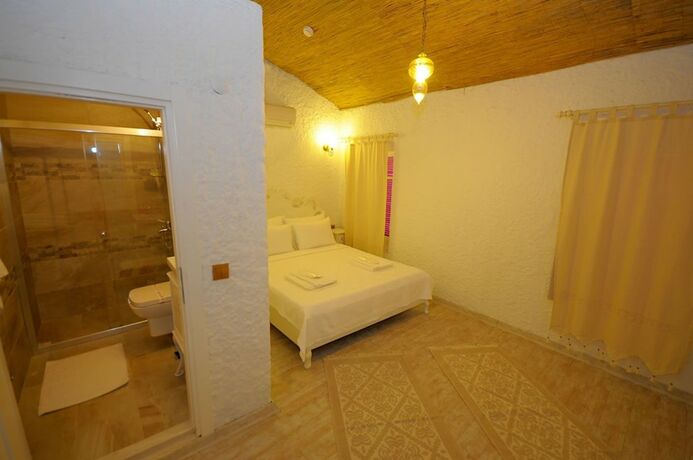 Imagen de la habitación del Alacati Alanur Otel. Foto 19