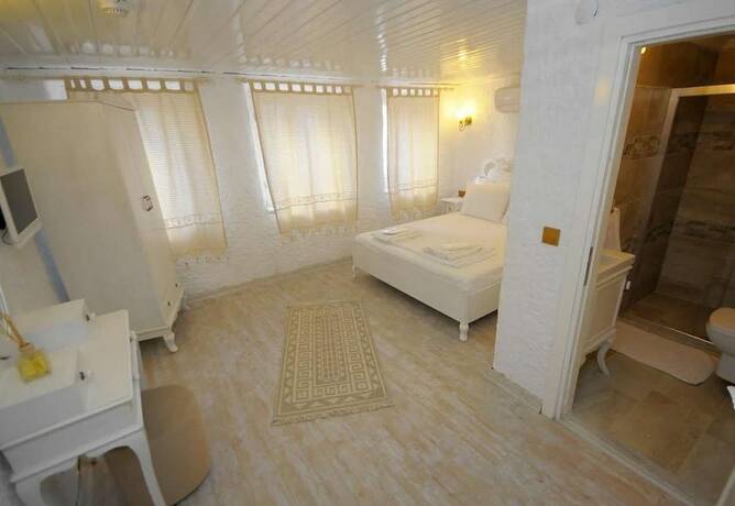 Imagen de la habitación del Alacati Alanur Otel. Foto 20
