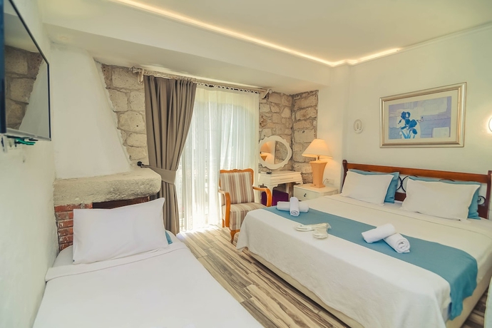 Imagen de la habitación del Alacati Asmalı Konak Otel. Foto 3