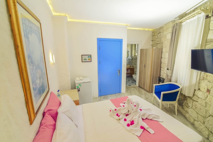 Imagen de la habitación del Alacati Asmalı Konak Otel. Foto 5