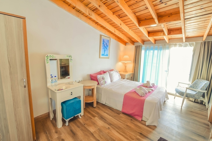 Imagen de la habitación del Alacati Asmalı Konak Otel. Foto 8