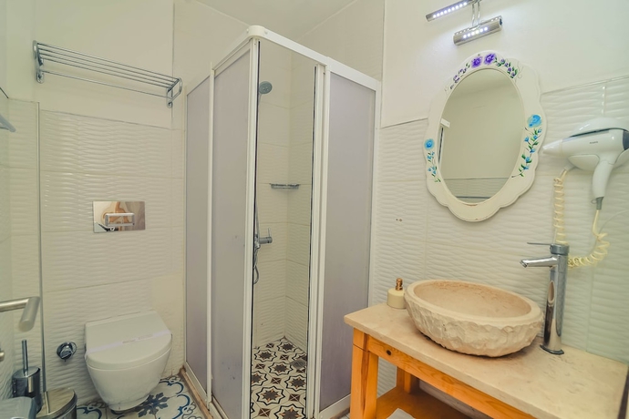 Imagen de la habitación del Alacati Asmalı Konak Otel. Foto 9
