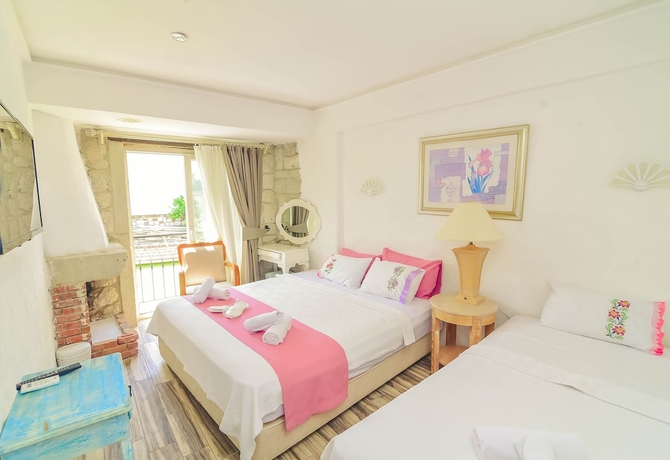 Imagen de la habitación del Alacati Asmalı Konak Otel. Foto 10