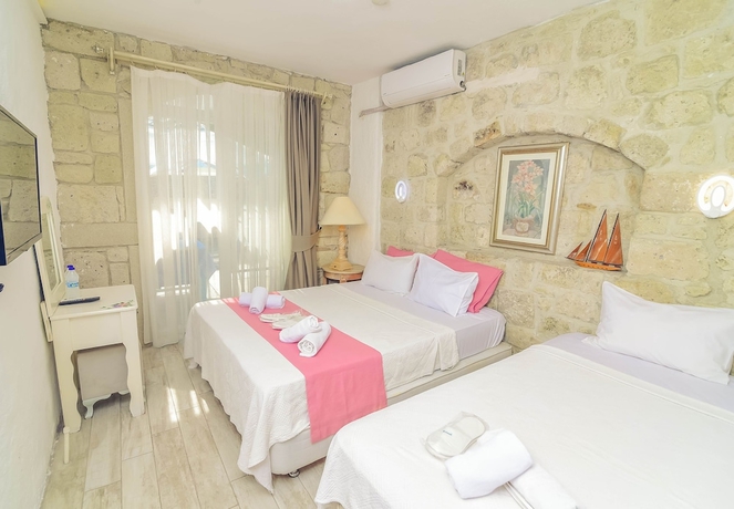 Imagen de la habitación del Alacati Asmalı Konak Otel. Foto 11