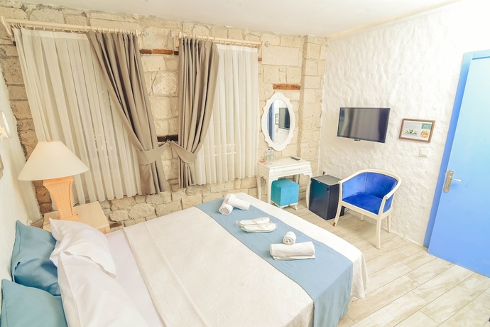 Imagen de la habitación del Alacati Asmalı Konak Otel. Foto 13