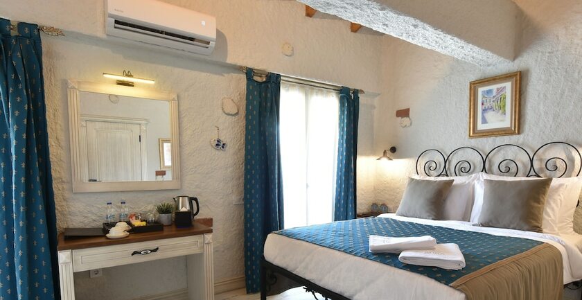 Imagen de la habitación del Alacati Aura Plus. Foto 15