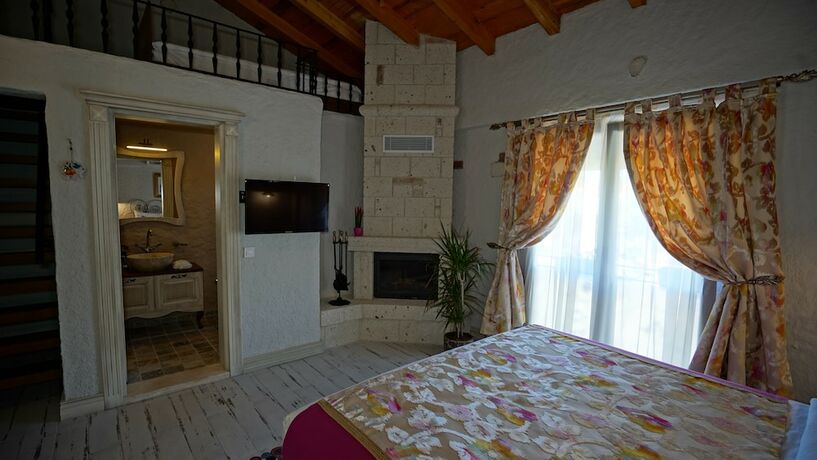 Imagen de la habitación del Alacati Aura Plus. Foto 16