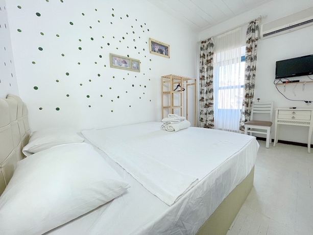 Imagen de la habitación del Alacati Cadde Otel. Foto 8