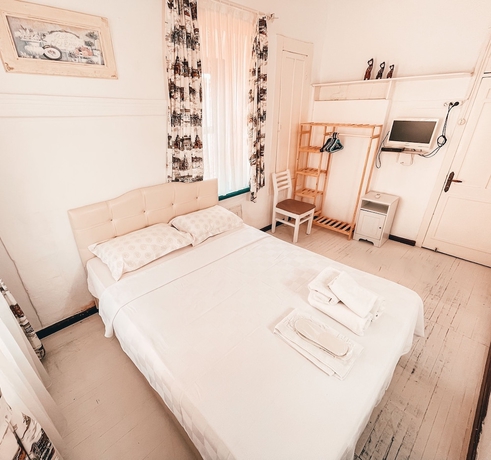 Imagen de la habitación del Alacati Cadde Otel. Foto 9