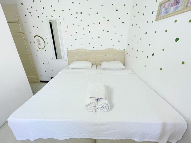 Imagen de la habitación del Alacati Cadde Otel. Foto 11