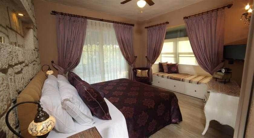 Imagen de la habitación del Alacati Mandalina Hotel. Foto 6