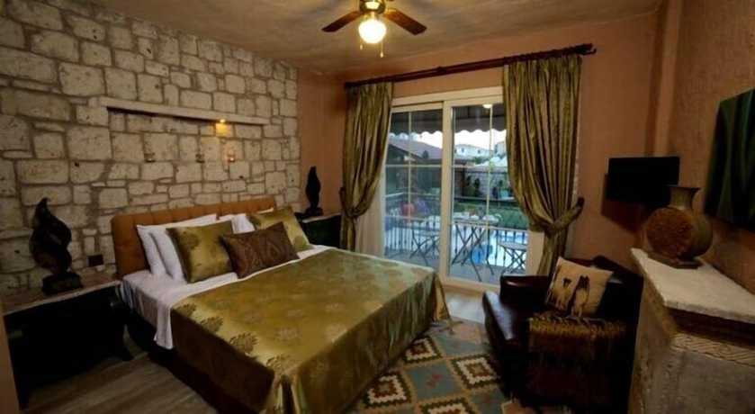 Imagen de la habitación del Alacati Mandalina Hotel. Foto 7