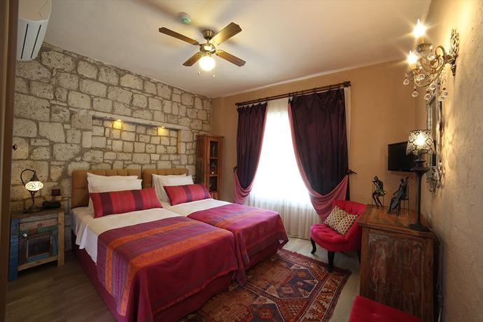 Imagen de la habitación del Alacati Mandalina Hotel. Foto 9