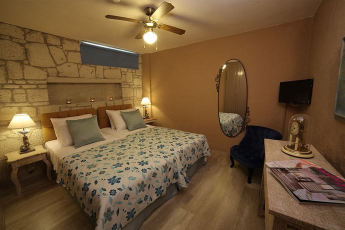 Imagen de la habitación del Alacati Mandalina Hotel. Foto 14