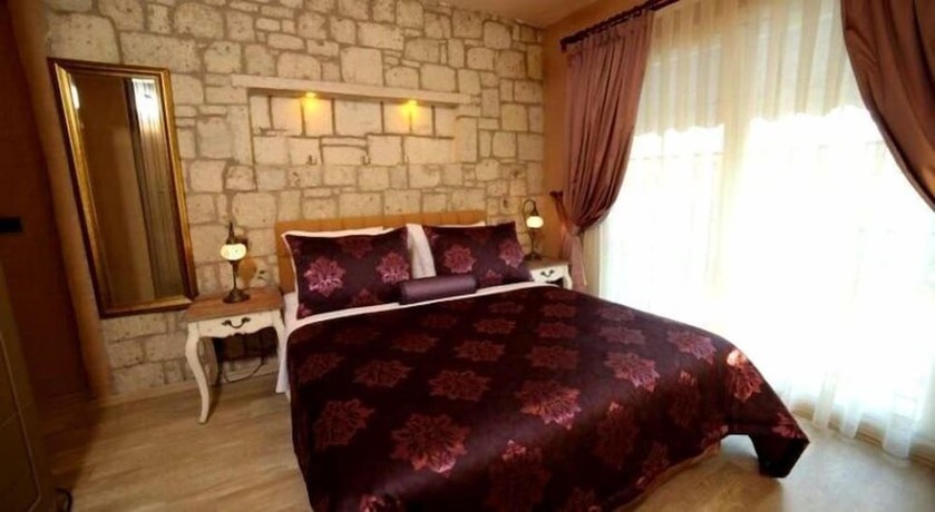 Imagen de la habitación del Alacati Mandalina Hotel. Foto 15