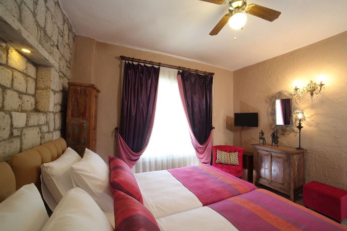 Imagen de la habitación del Alacati Mandalina Hotel. Foto 16