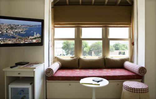 Imagen de la habitación del Alacati Marina Palace. Foto 5